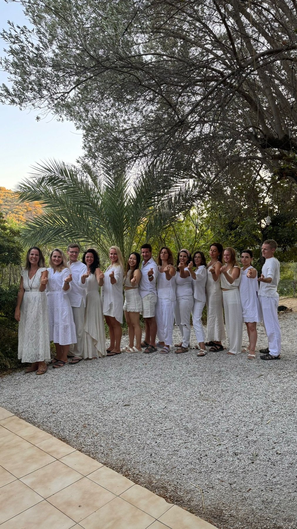 Una with an international yoga teacher-training group